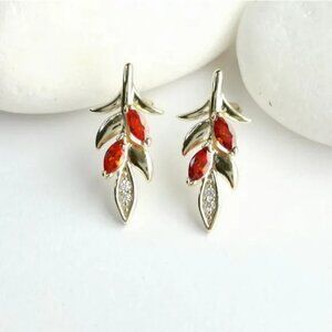 Garnet and White Topaz stud earrings 14k gold leaf design